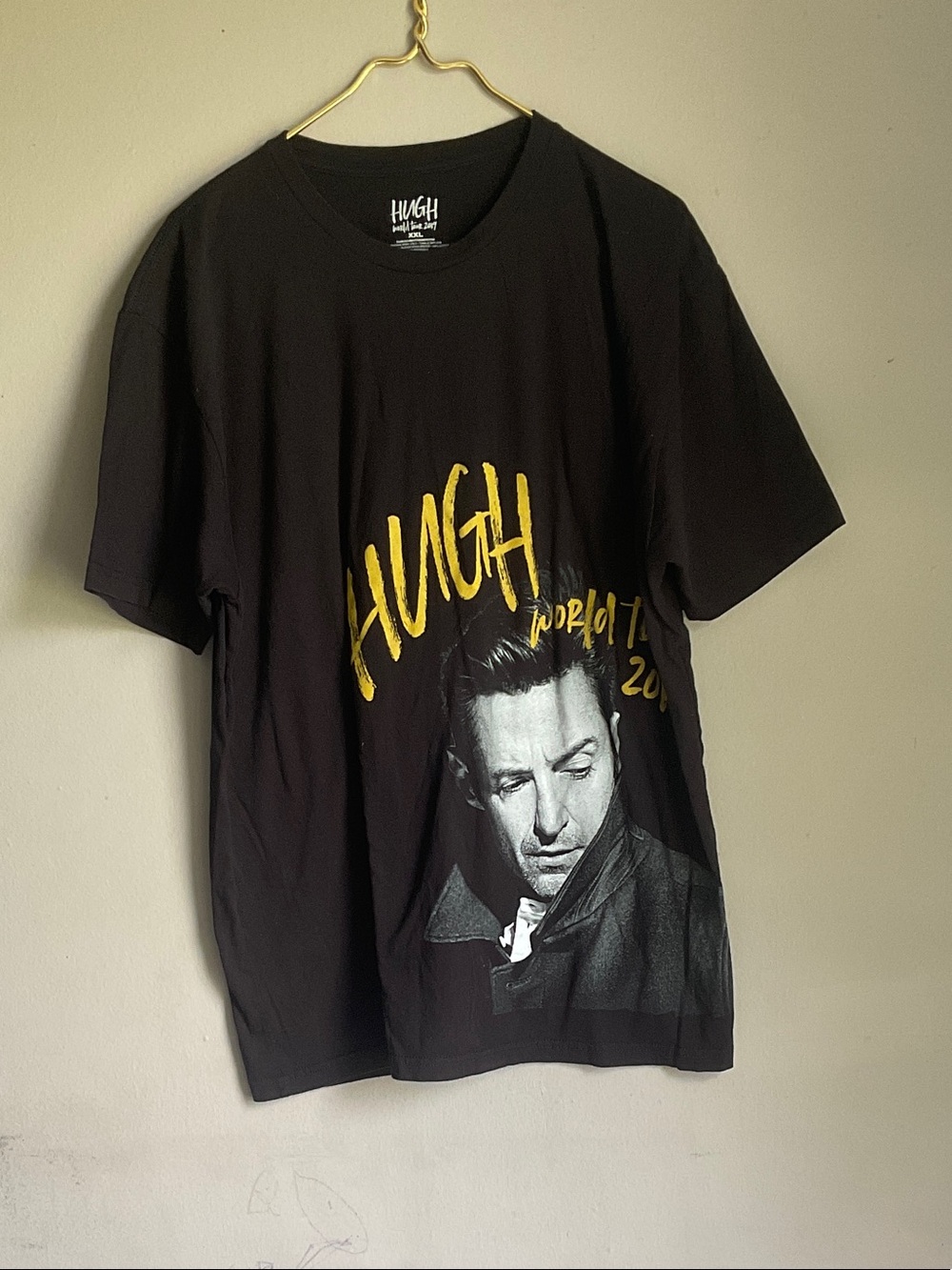 Black Short-Sleeve Graphic Tee with Yellow Script